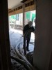 g. Workmen blowing the insulation (102) (384x512, 61.2 kilobytes)