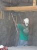 g. Workmen blowing the insulation (105) (384x512, 73.7 kilobytes)