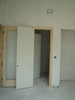 p. Now the molding and doors are being installed (106) (384x512, 41.4 kilobytes)