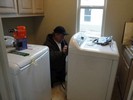 m. Brandon installing the washer and dryer (683x512, 83.8 kilobytes)